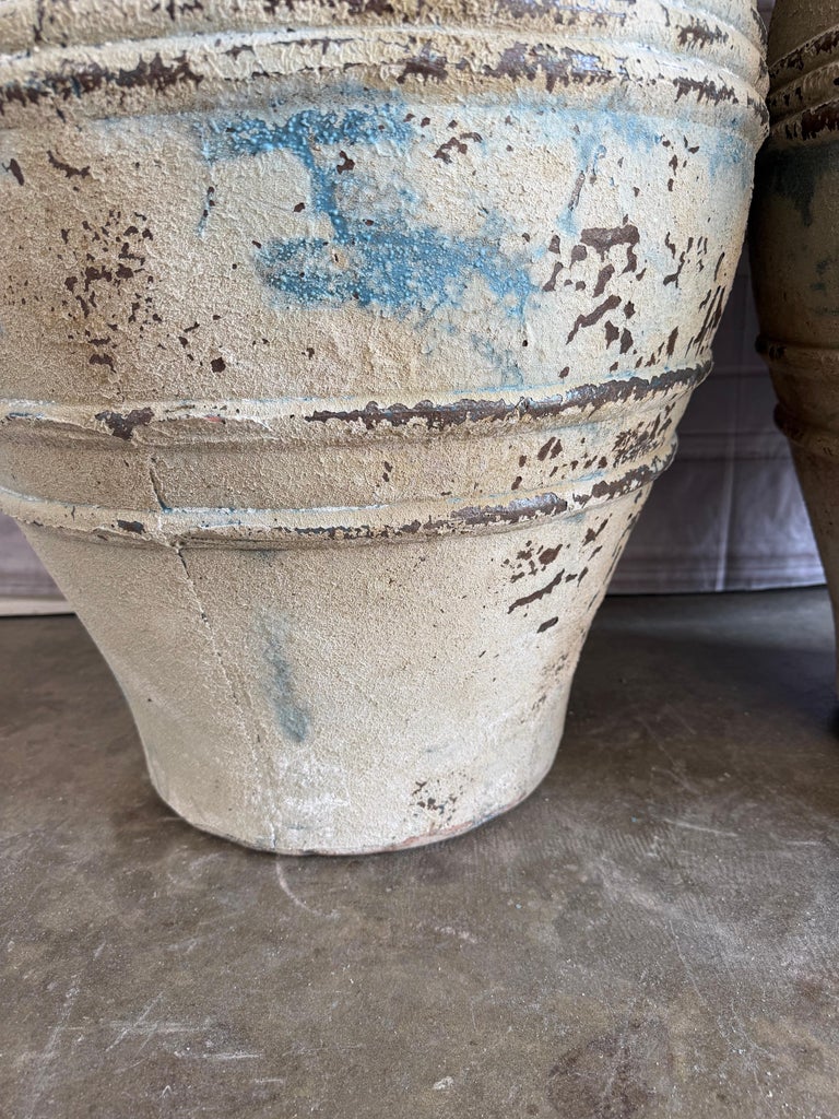 Pair of Large Distressed Mediterranean Style Terracotta Olive Jars with Handles