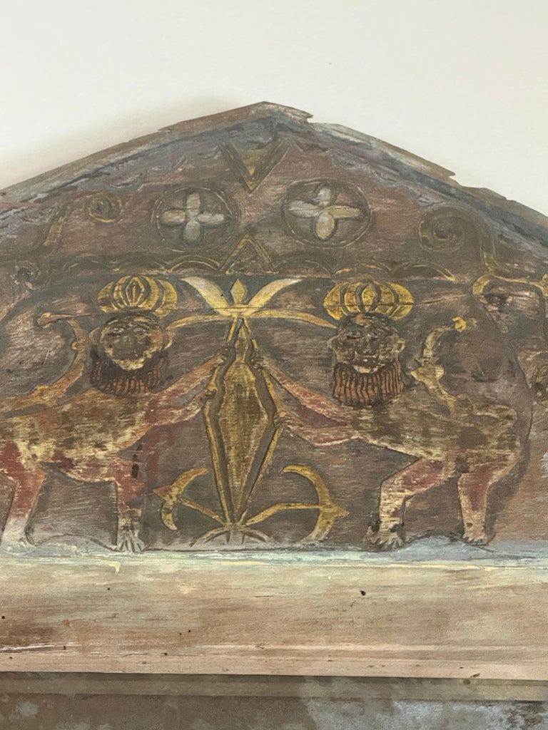 Pair of 19th Century Painted Folk Art Arched Mirrors with Heraldic Lion Crests