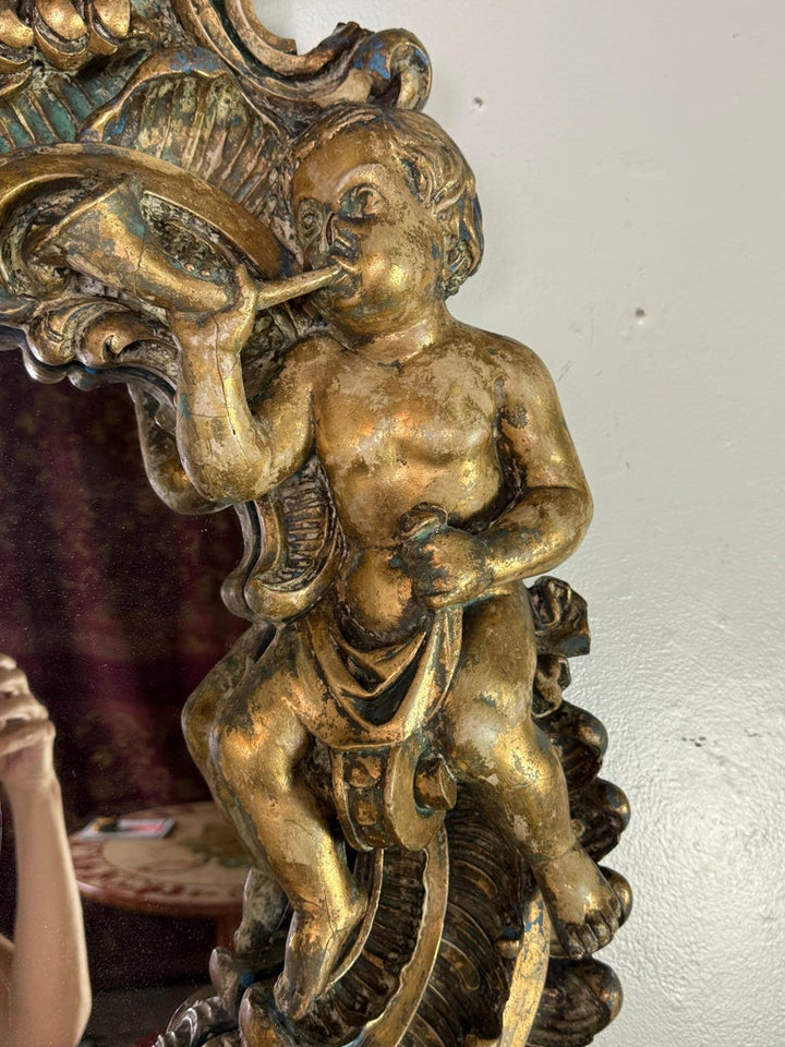 19th Century Italian Rococo Giltwood Figural Mirror