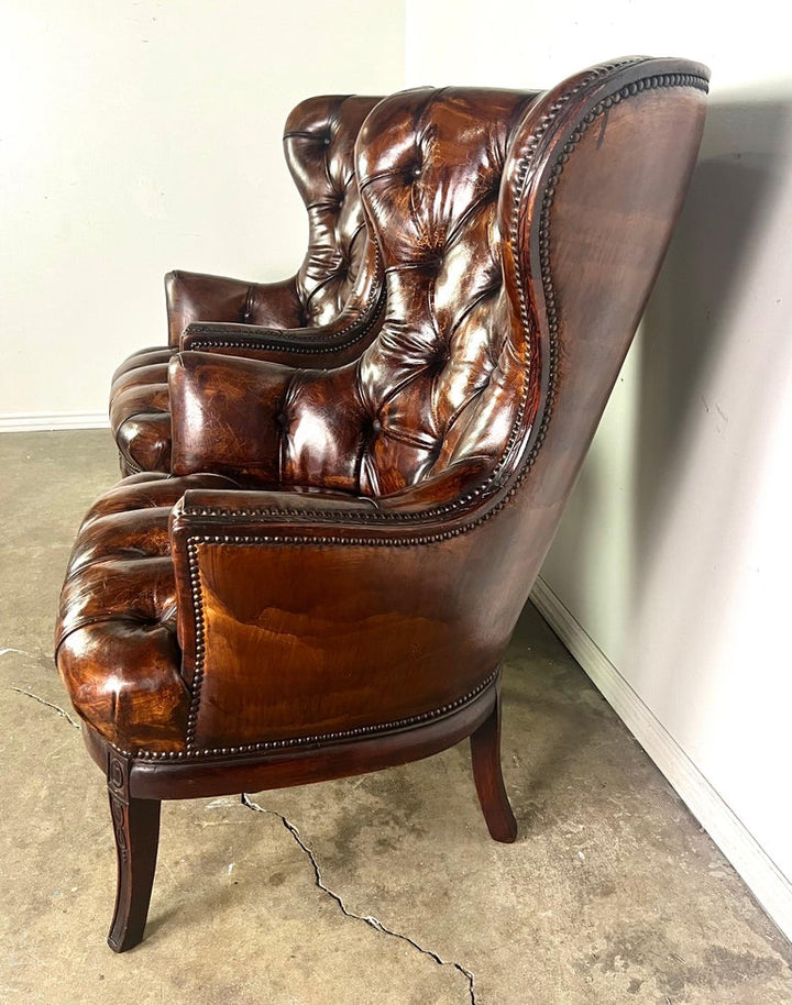 Pair of 19th Century English Leather Tufted Armchairs