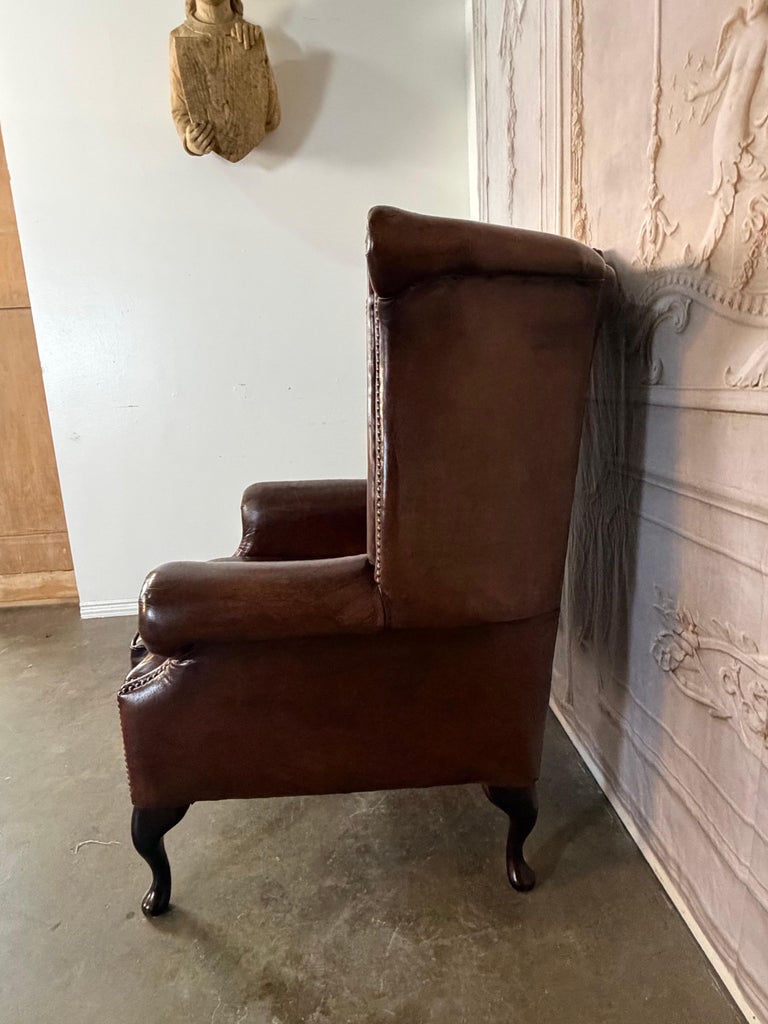 Pair of Vintage English Tufted Leather Wingback Armchairs