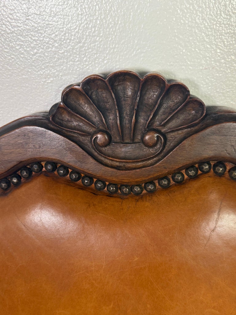 Set of Eight French Carved Wood Dining Chairs with Leather Upholstery