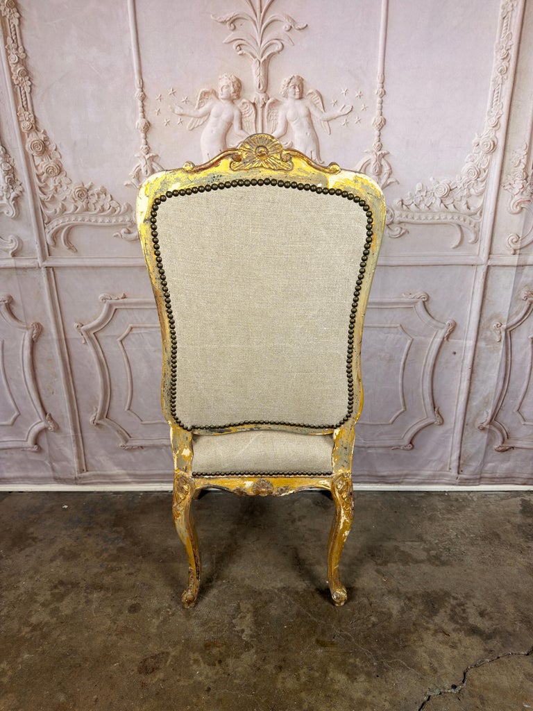 Set of 14 French Louis XV Style Gilt Dining Chairs with Linen Upholstery