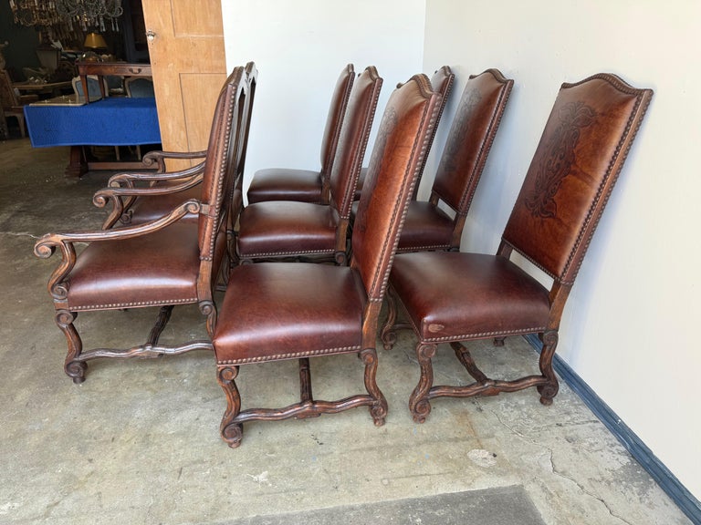 Set of Eight Spanish Revival Leather and Carved Walnut Dining Chairs
