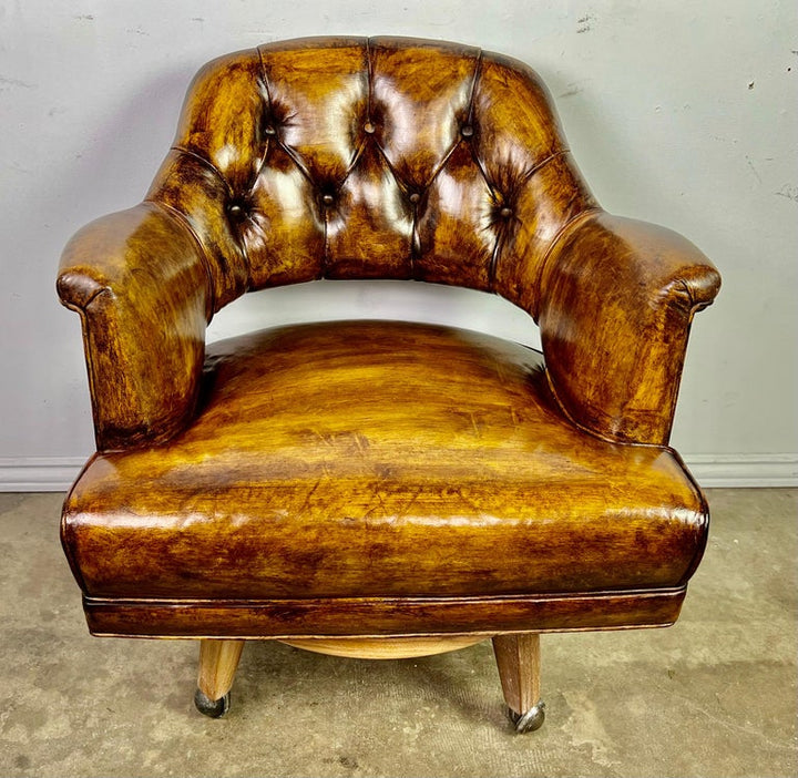 Pair of Mid-Century Leather Tufted Armchairs on Swivels