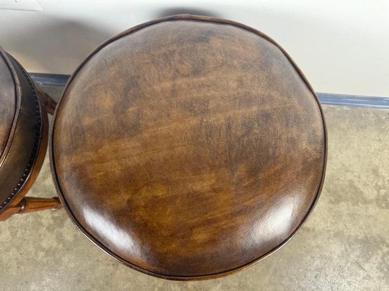 Pair of Louis XVI–Style Swivel Stools in Patinated Leather, Mid-20th Century
