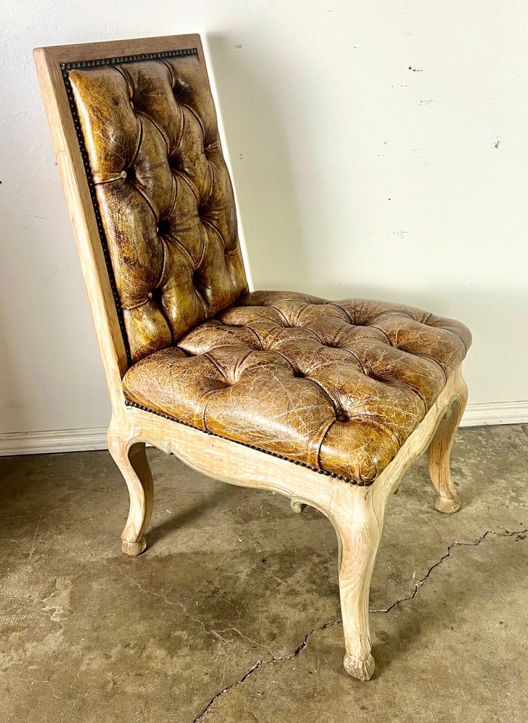 Set of Eight French Leather Tufted Dining Chairs C. 1940