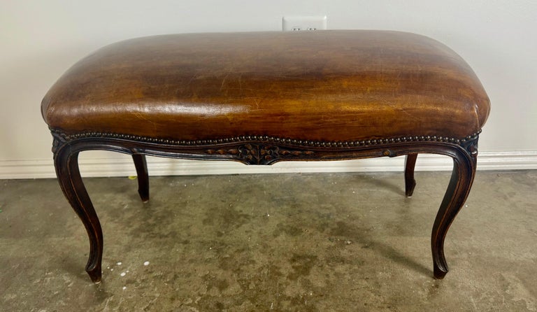 French Louis XV Style Carved Bench with Distressed Leather Upholstery