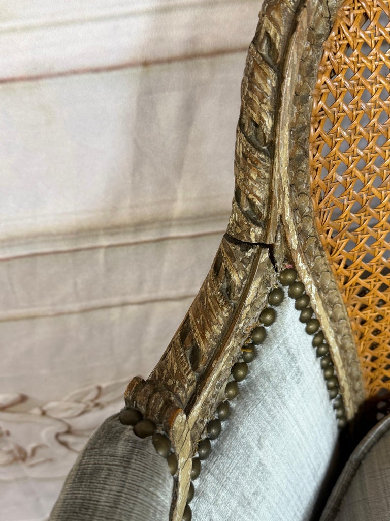 Antique French Louis XVI Style Painted Bergère Chair with Cane Back