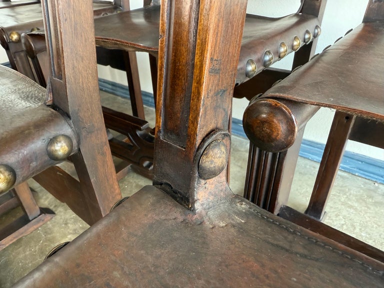 Set of Ten Spanish Revival Leather Dining Chairs, circa 1920s