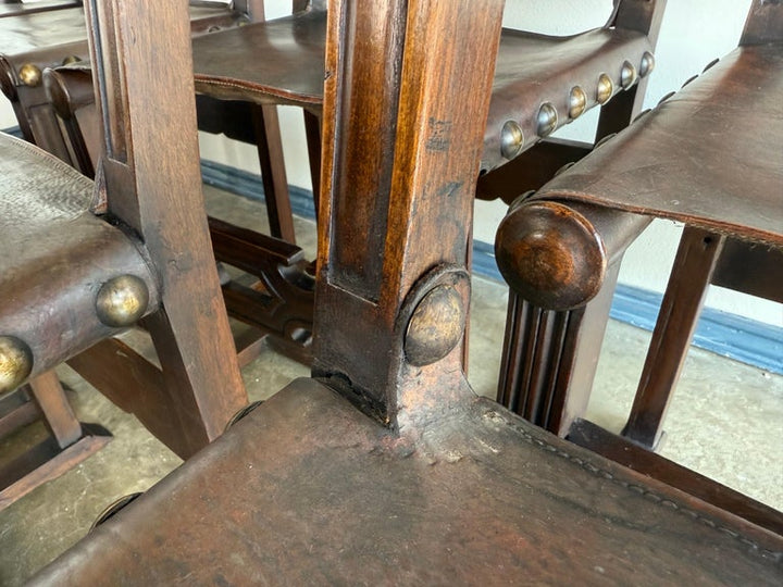 Set of Ten Spanish Revival Leather Dining Chairs, circa 1920s