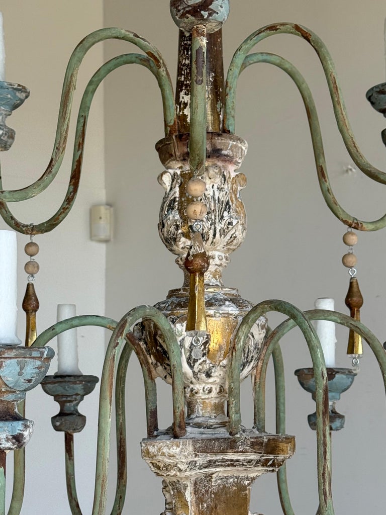 Grand Italian Painted and Giltwood Twelve-Light Chandelier