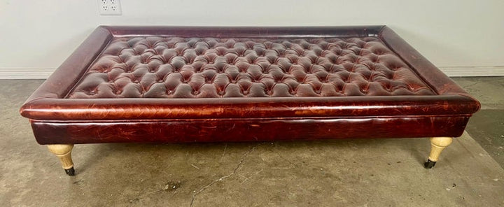 English Leather Tufted Ottoman on Casters