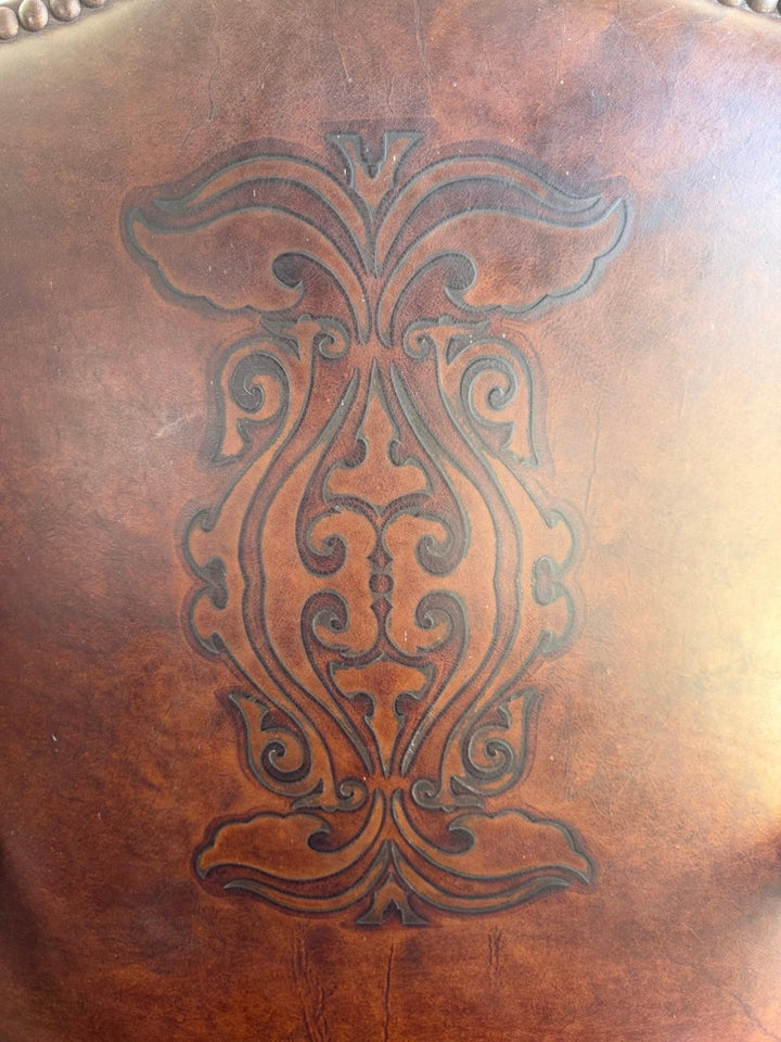 Set of Eight Spanish Revival Leather and Carved Walnut Dining Chairs