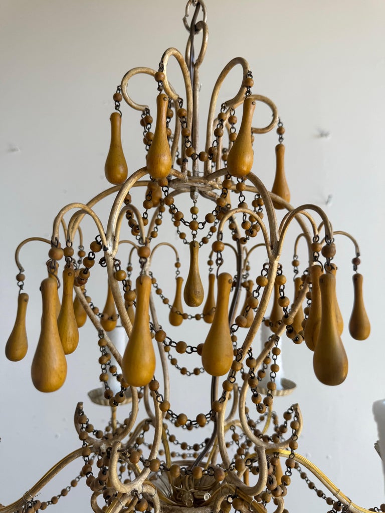 Pair of Italian Gilt Iron and Wood Beaded Chandeliers, Mid-20th Century