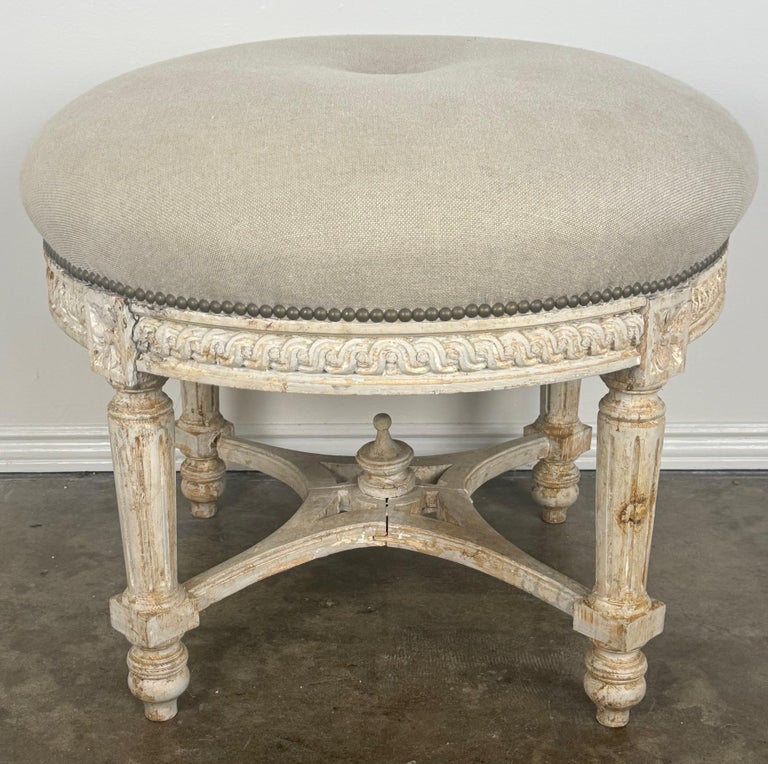 French Neoclassical upholstered ottoman, early 20th century.