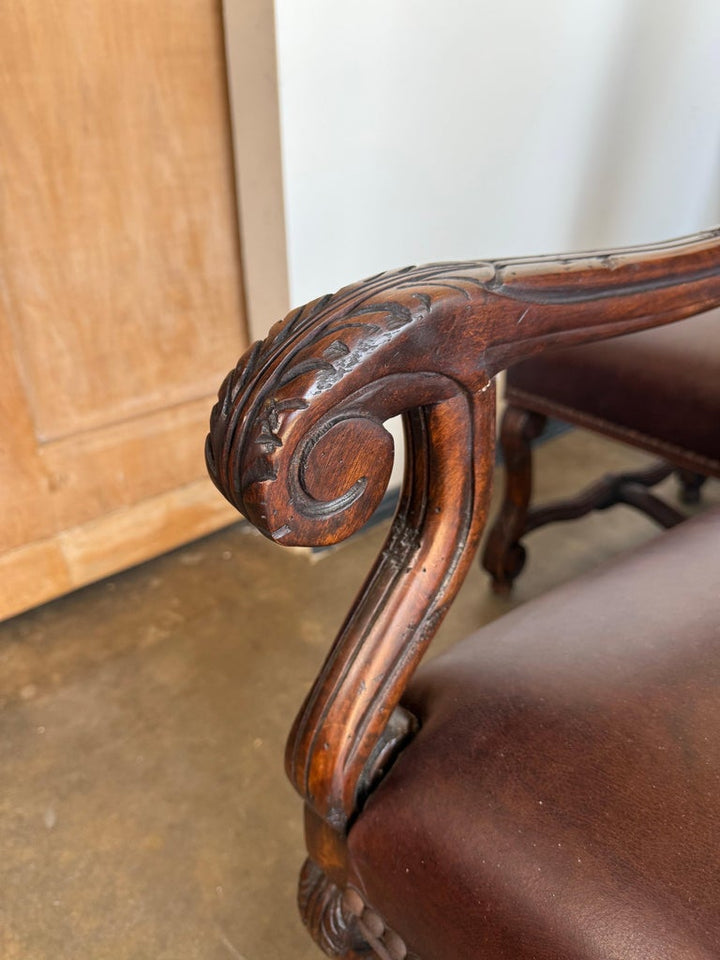 Set of Eight Spanish Revival Leather and Carved Walnut Dining Chairs