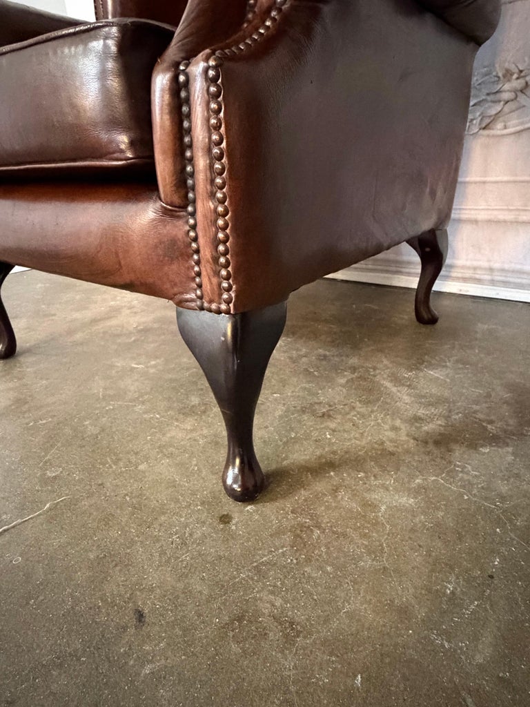 Pair of Vintage English Tufted Leather Wingback Armchairs