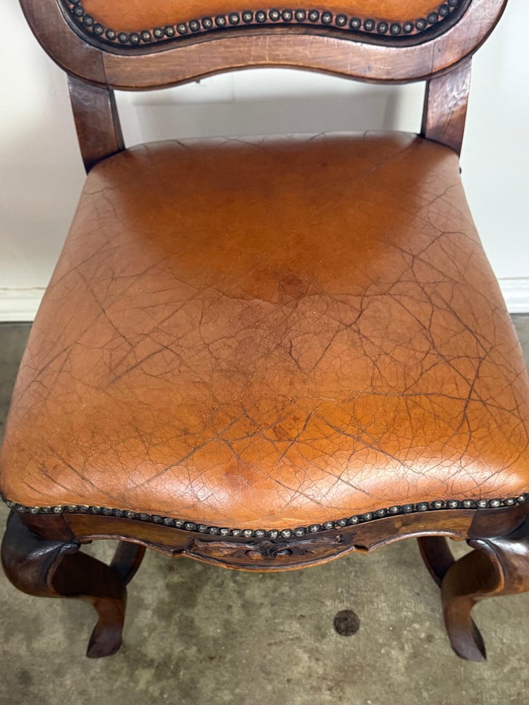 Set of Eight French Carved Wood Dining Chairs with Leather Upholstery