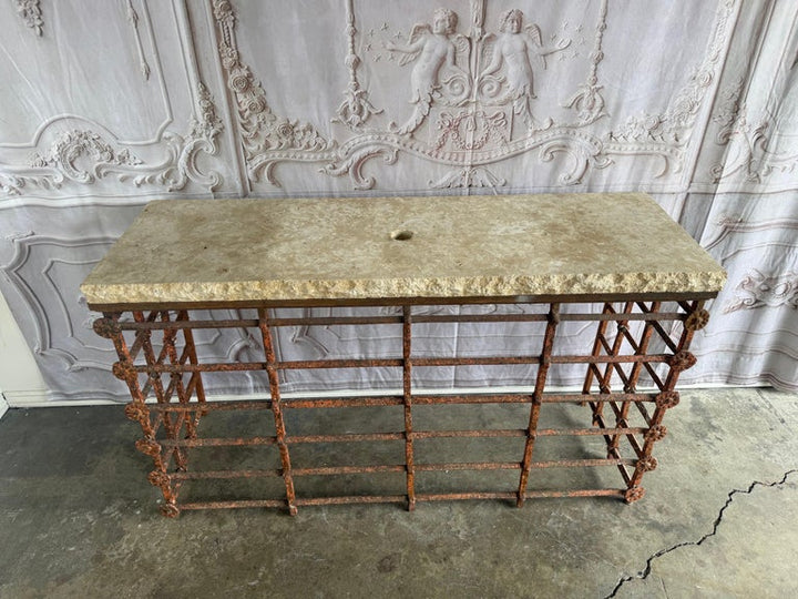 Rustic Console Table with Textured Stone Top and Hand-Forged Iron Base