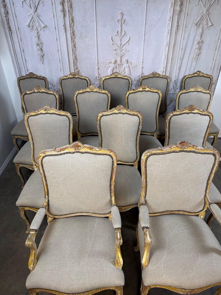 Set of 14 French Louis XV Style Distressed Dining Chairs with Linen Upholstery