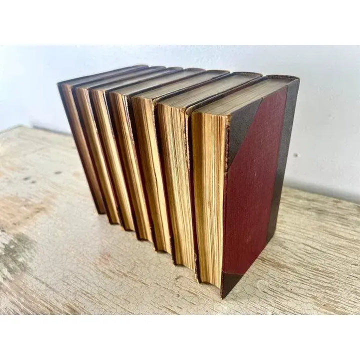 Set of Seven Leather Volumes of Daniel De Foe's Works
