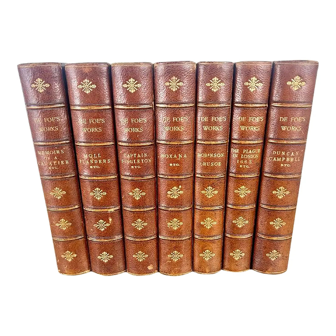 Set of Seven Leather Volumes of Daniel De Foe's Works