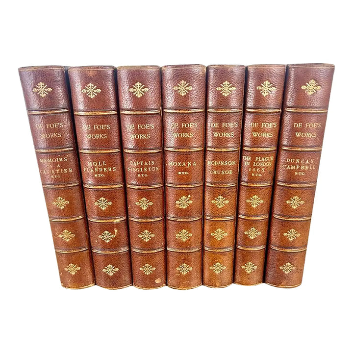 Set of Seven Leather Volumes of Daniel De Foe's Works