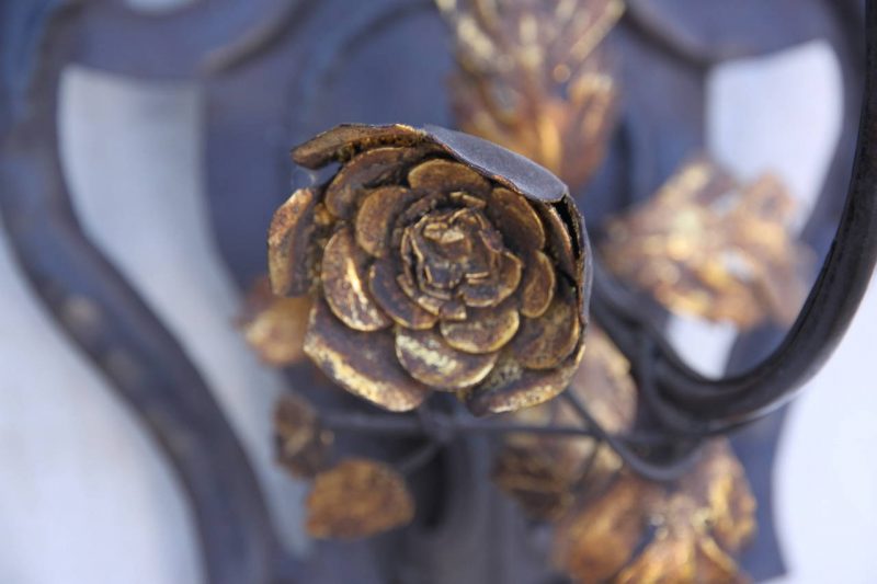 Wrought Iron Fleur De Lys Sconces with Gilt Flowers